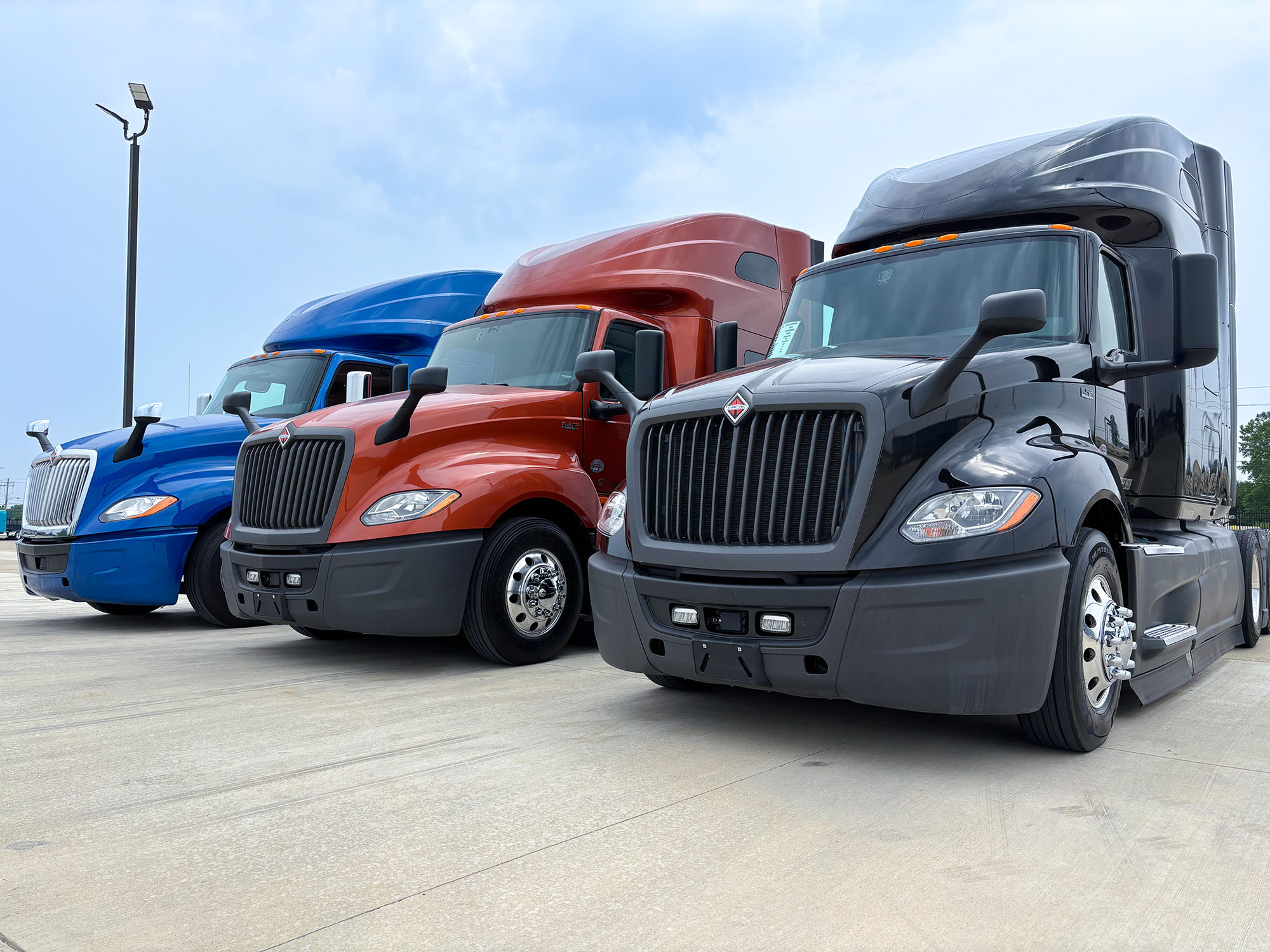 International semi trucks lined up in a row