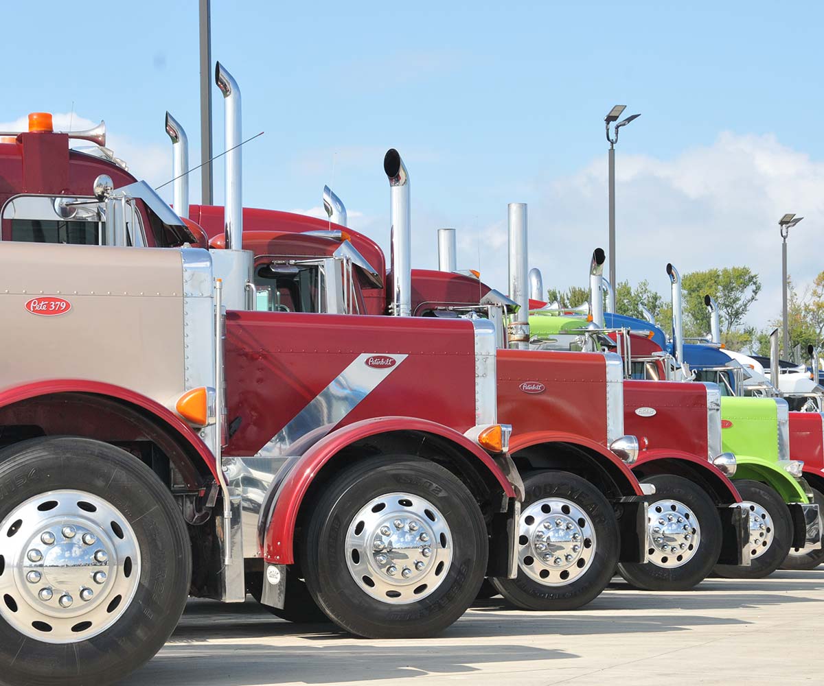 A row of Peterbilt semi trucks