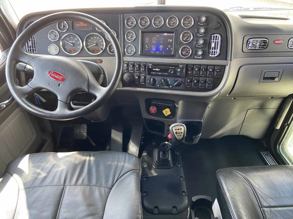 The interior of a peterbilt 389 semi truck